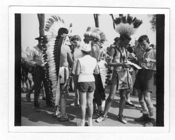 Scouts wearing Indian head dresses