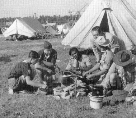 Scouts cooking in camp