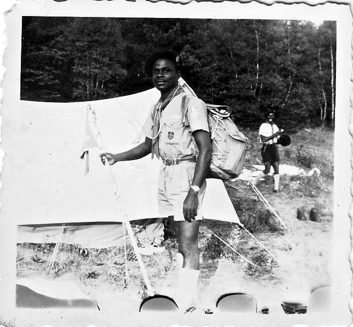 Kouassi by his tent at WJ'55