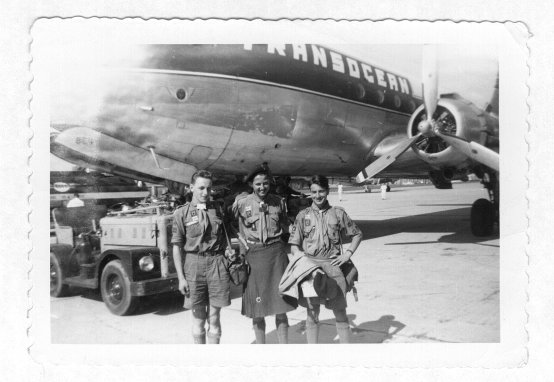 Bill Connor and friends by their American Trans-Ocean Skymaster airplane