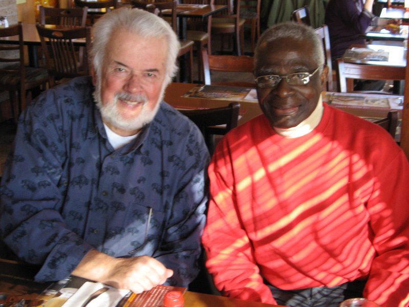 Claude and Jonas catch up over a meal in 2010